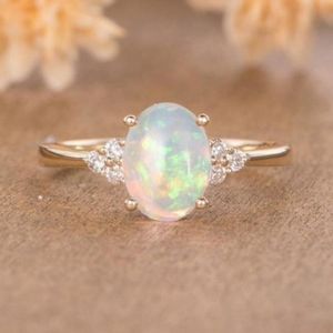 Gorgeous simulated opal ring & simulated diamonds
